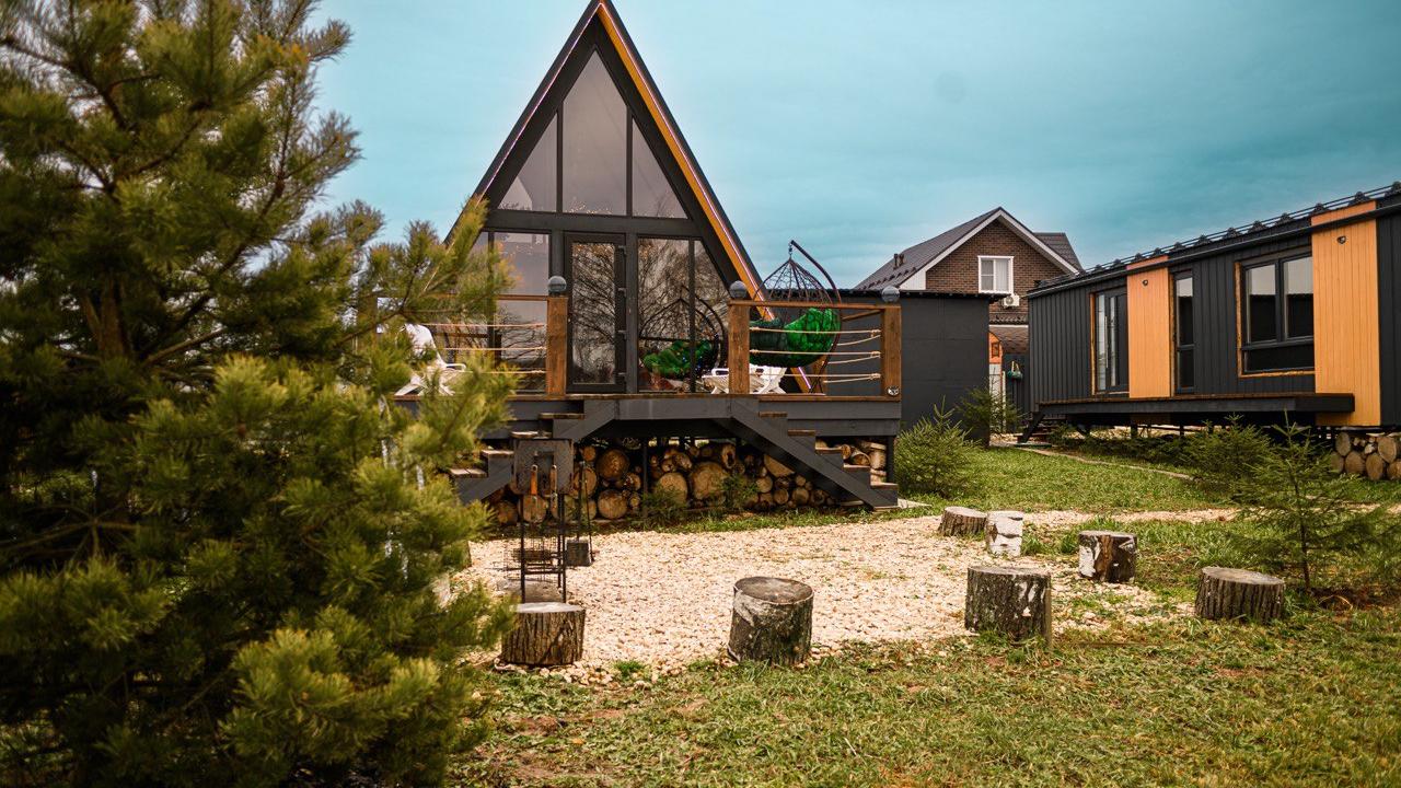 Real photos of A-frame lake house in Kuzminsky