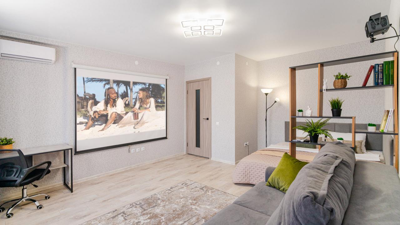 Реальные фото Modern apartment with a home cinema