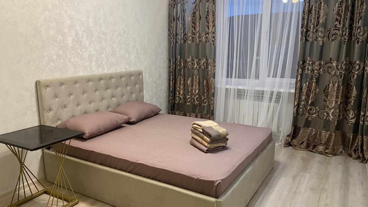 Real photos of apartment 2 minutes from the airport in a courtyard with a closed area
