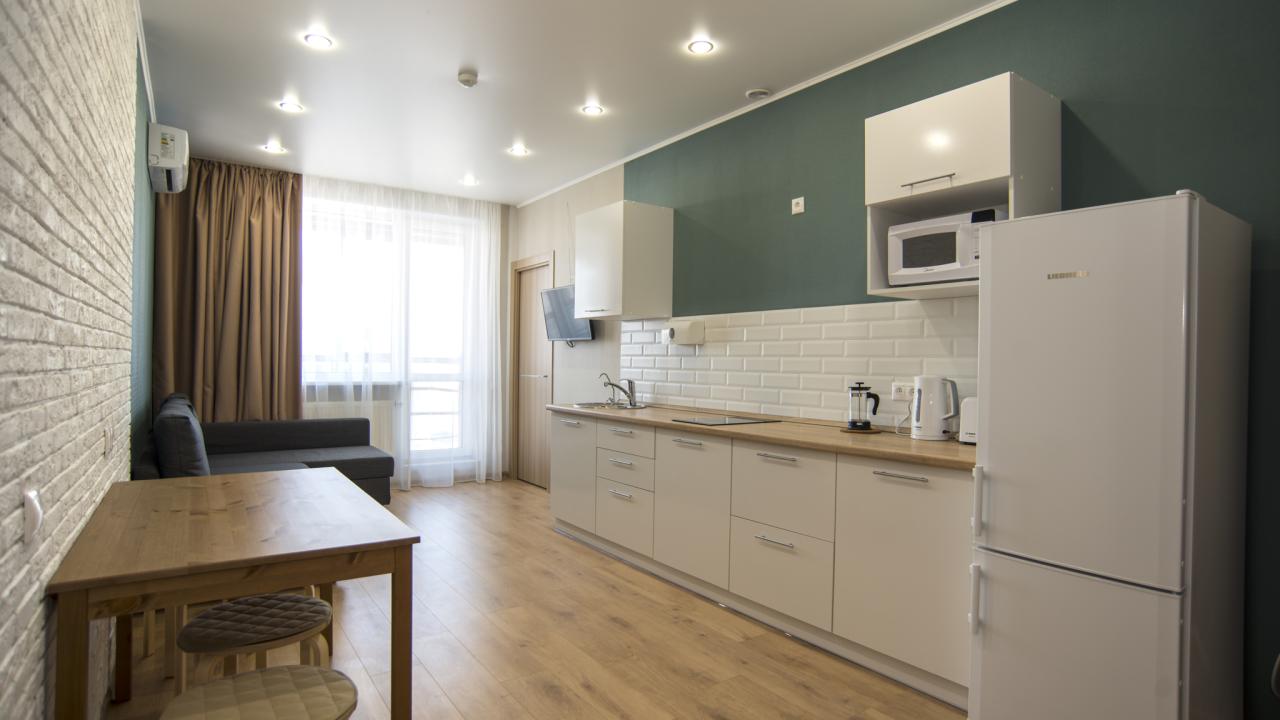 Реальные фото Апартаменты Sibgat Apartments на улице Алексея Козина 3А