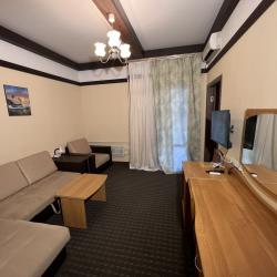 Номер улучшенный семейный с 2 односпальными кроватями