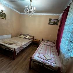 Номер улучшенный с 3 односпальными и 1 двуспальной кроватью