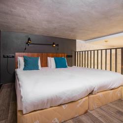 Двухуровневые апартаменты Лофт