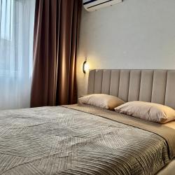 Фото Апартаменты на улице Октябрьская 181/2 корпус 3