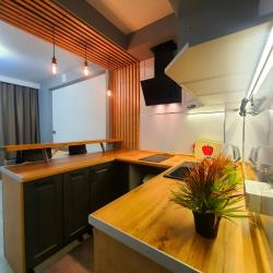 Фото Отель Уютная квартира-студия в новом микрорайоне