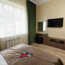 Фото Отель Камин-Хаус