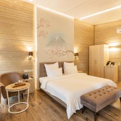 Фото Отель Охта Парк коттеджи