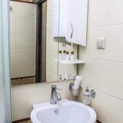 Номер улучшенный семейный с 4 односпальными кроватями