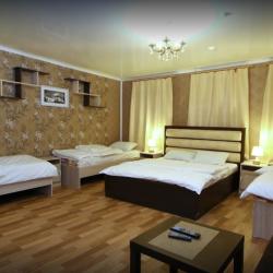 Номер люкс с 3 односпальными и 1 двуспальной кроватью