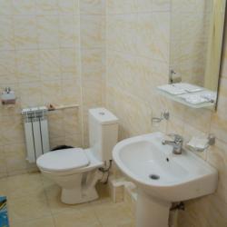 Номер улучшенный с 4 односпальными кроватями (корпус Б)