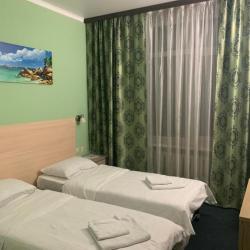 Номер стандарт с 2 односпальными кроватями (с завтраком)