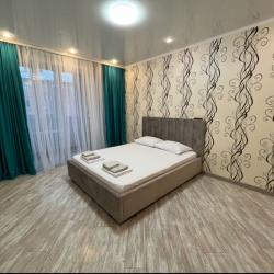 Фото Апартаменты Happy Home(ХэппиХоум) на улице Зураба Магкаева 83/3