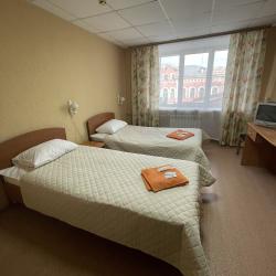 Номер эконом с 2 односпальными кроватями (удобства на блок)