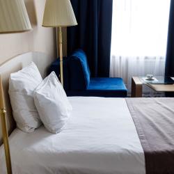 4-местный 2-комнатный номер улучшенный с 2 односпальными и 1 двуспальной кроватью