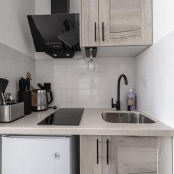 Апартаменты студия Апартаменты на Эйнштейна 4 с 2 односпальными кроватями