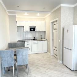 Фото Отель Уютная квартира на улице Николая Ершова 65Б