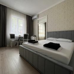 Фото Апартаменты Happy Home(ХэппиХоум) на улице Зураба Магкаева 83/3