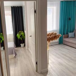 Фото Отель Уютная квартира в новом ЖК рядом с Немецкой деревней, Экспоград Юг