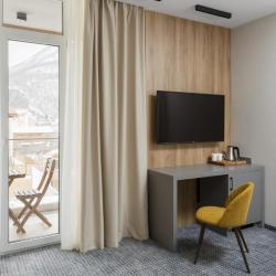 Фото Отель Ikos Polyana