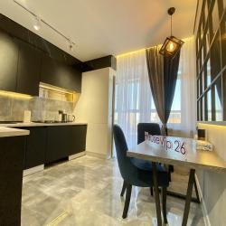 Фото Апартаменты Housevip на улице Матрены Наздрачевой 3/1