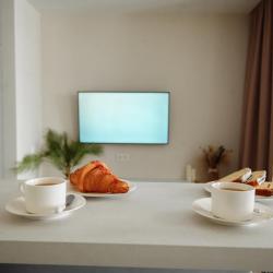 Фото Апартаменты на улице Ивана Захарова 17