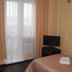 Номер стандарт с 1 односпальной кроватью с балконом