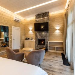 Фото Отель Охта Парк коттеджи