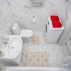Фото Апартаменты на улице Шухова 1Б