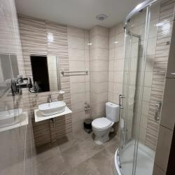 Номер улучшенный семейный с 2 односпальными кроватями