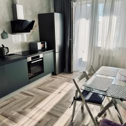 Фото Апартаменты на улице Октябрьская 181/2 корпус 3