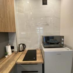 Фото Отель K_Apartments (К_Апартментс) на улице Гризодубовой 1/3
