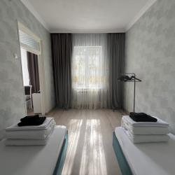 Фото Апартаменты Happy Home(ХэппиХоум) на улице Зураба Магкаева 83/3