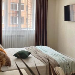 Фото Апартаменты на улице Просторная 15к2