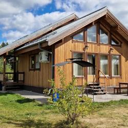 Фото Отель Коттедж А4 на базе отдыха Новинки Парк