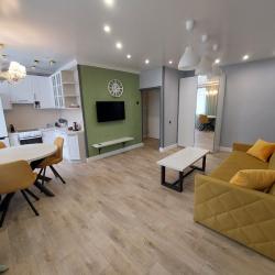 Фото Отель TroeSutokApart Комсомольская 50