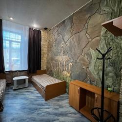 Кровать в трехместном общем номере