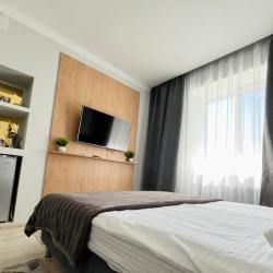 Номер повышенной комфортности с 1 двуспальной кроватью #8