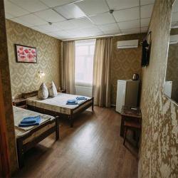 Номер стандарт с 1 односпальной и 1 двуспальной кроватью