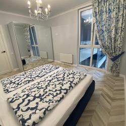 Фото Апартаменты на бульваре Олимпийский 4