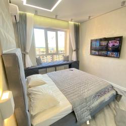 Фото Апартаменты Housevip на улице Матрены Наздрачевой 3/1