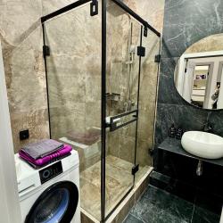 Фото Апартаменты на улице Октябрьская 181/2 корпус 3