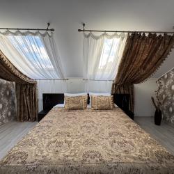 Номер люкс с 1 двуспальной кроватью