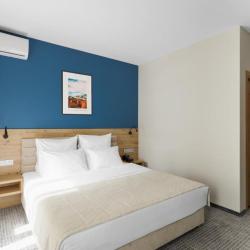 Фото Отель Ikos Polyana