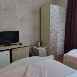 Комната комфорт с 2 односпальными и 1 двуспальной кроватью