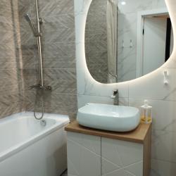 Фото Отель Современная двухкомнатная квартира с кухней-гостиной