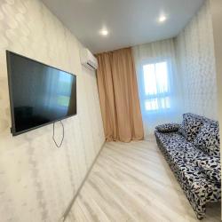 Фото Отель Уютная квартира на улице Рауиса Гареева 105Б