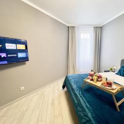 1-комнатные апартаменты люкс на 17 этаже с видом на реку Тура