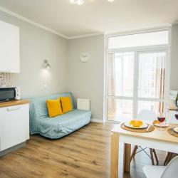 Фото Отель UzorApart Просторная евродвушка у пляжа Алексино с видом на закат