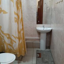 Кровать в 10-местном общем номере