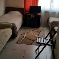 Кровать в 3-местном общем улучшенном номере